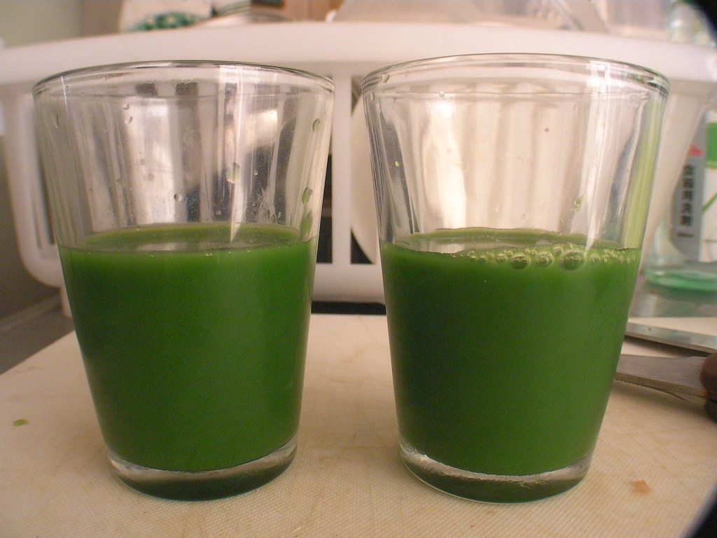 Two small glasses of green juice