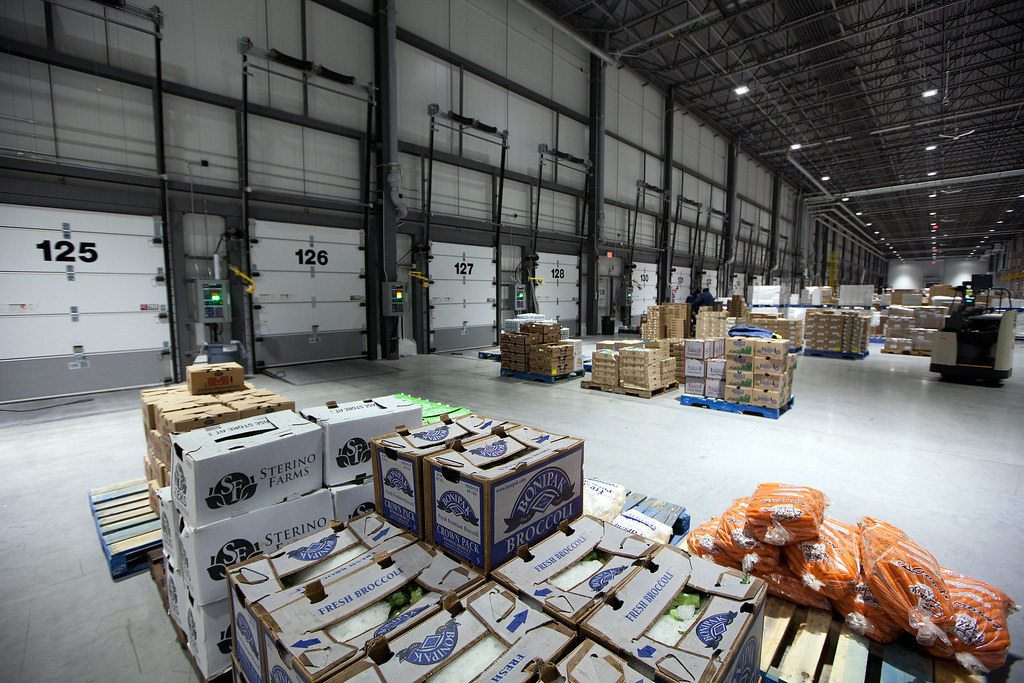 Produce being handled inside a refrigerated distribution facility
