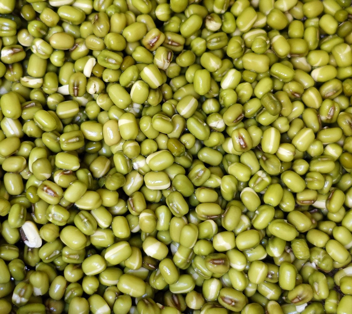 Mung beans soaking in water